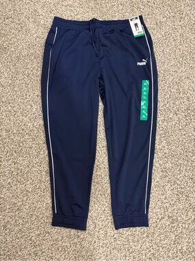 Puma women’s Navy Blue Track Pants with White Piping XL